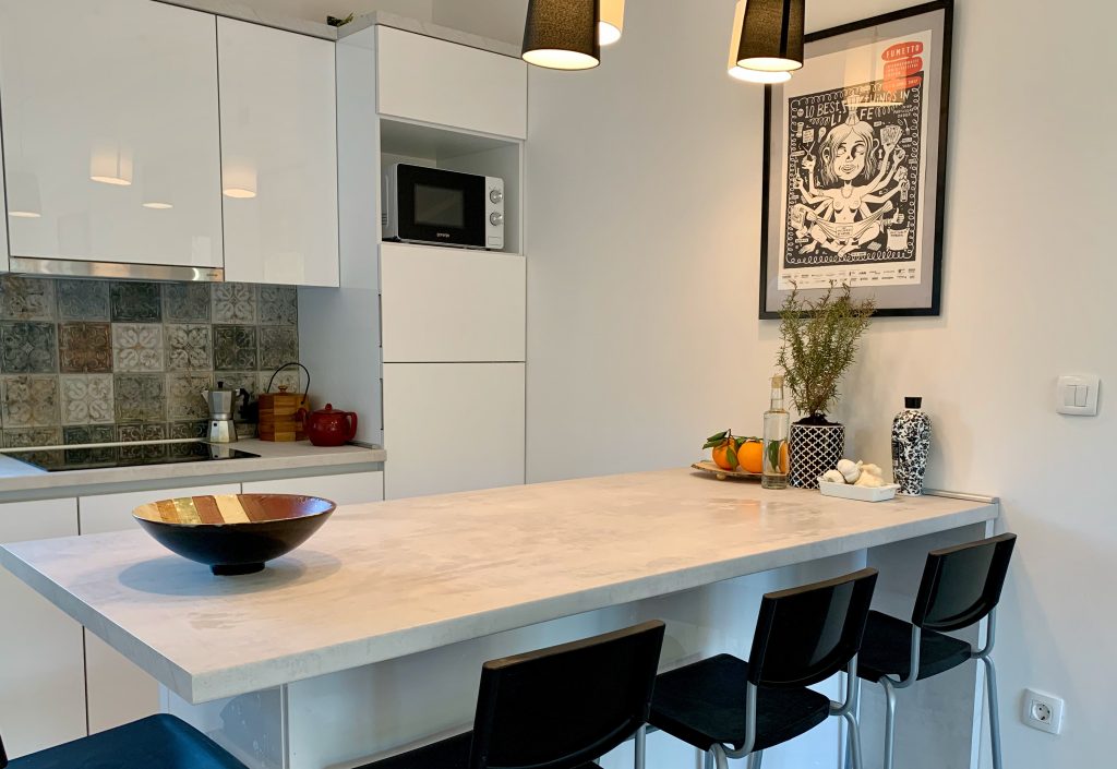 Apartment kitchen with island at MiaBella Resort
